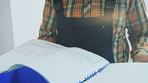 Engineer builder at construction site Stock Footage 69864044