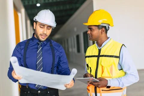 Engineer builder team working with architect designer work inspect large bu.. Stock Photos