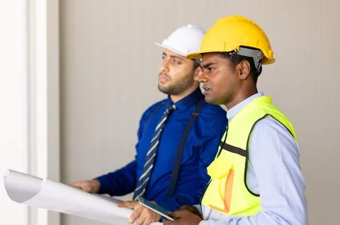 Engineer builder team working with architect designer work inspect large bu.. Stock Photos
