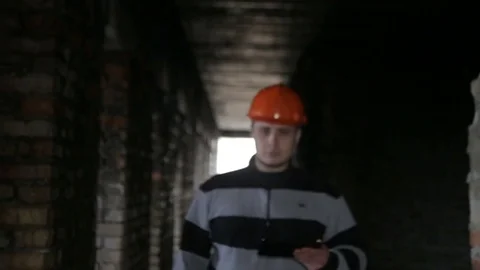 Engineer builder thinks about the object Stock Footage 73474242