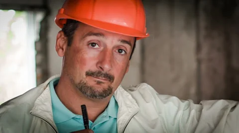 The Engineer-Builder Thinks On The Object. Close-Up RAW Video Stock Footage 30441329