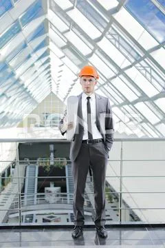 The engineer-builder watching, control process Stock Photos