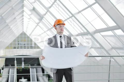 The engineer-builder watching, control process Stock Photos