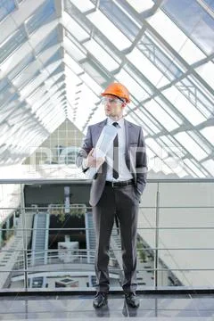 The engineer-builder watching, control process Stock Photos
