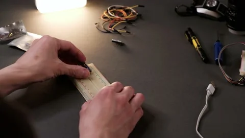 An Engineer building gyroscore on the breadboard Stock Footage 150667251