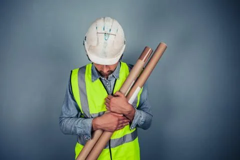 Engineer with building plans Stock Photos