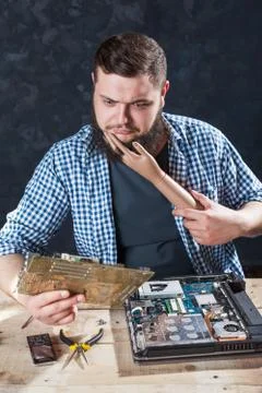 Engineer cant fix problem with computer hardware Stock Photos
