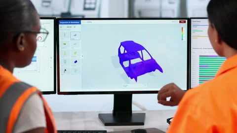 Engineer Carefully Analyzing 3D Structural Simulation Data Stock Footage 334530690