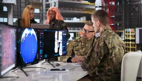 Engineer Carefully Analyzing Aerospace Rocket Designs Using Computer Programs Stock-Fotos