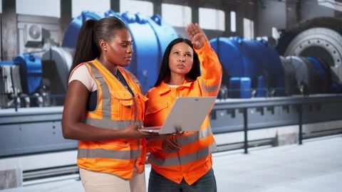 Engineer Carefully Inspects Power Plant Pipes While Stock Footage 333845851