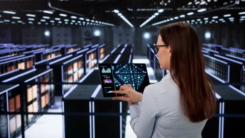 Engineer Carefully Monitors AI Training Stock Footage 330253901