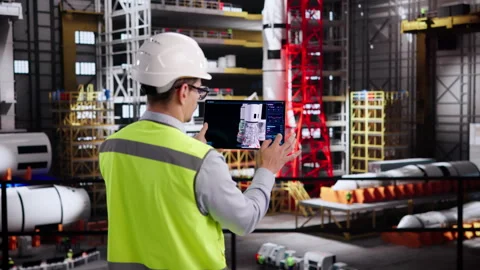 Engineer Carefully Programs Advanced Automation System Stock Footage 332499394