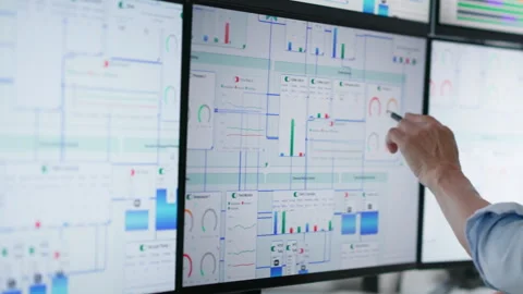 Engineer Carefully Traces SCADA Process Diagram Stock Footage 336374280