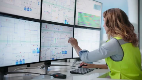Engineer Carefully Traces SCADA Process Diagram Stock Footage 337226502