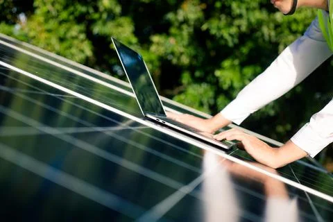 Engineer check data from the sensor of solar cells panel Stock Photos