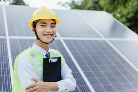 Engineer check data from the sensor of solar cells panel Stock Photos