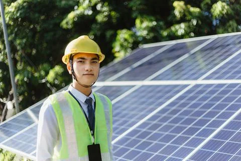 Engineer check data from the sensor of solar cells panel Stock Photos