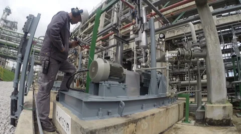 Engineer check sound of Motor in refinery plant Stock Footage 43557691