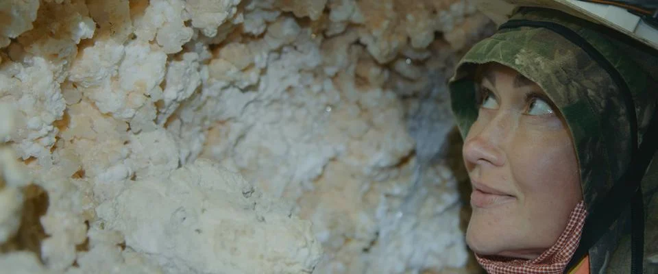 Engineer check stalactites. Scientist exploring of cave for geology science Stock Photos