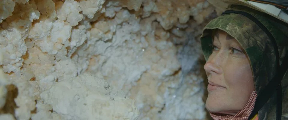 Engineer check stalactites. Scientist exploring of cave for geology science Stock Photos