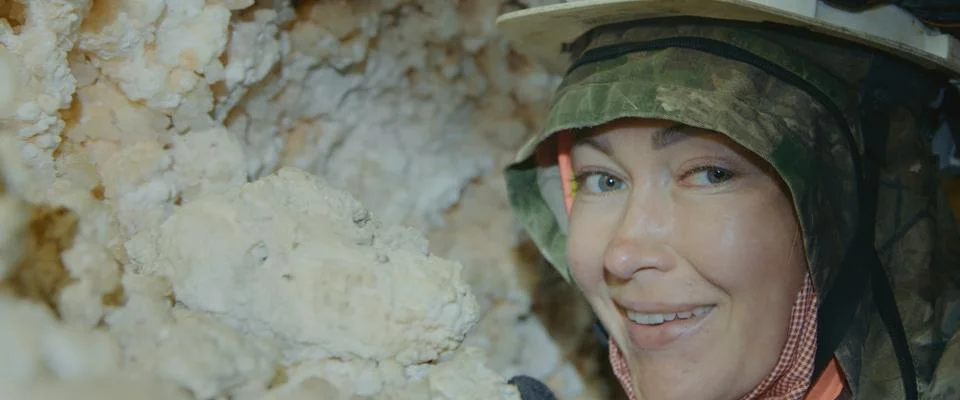 Engineer check stalactites. Scientist exploring of cave for geology science Stock Photos