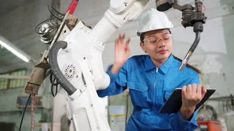 Engineer check up the system of robot machine Stock Footage 153075781