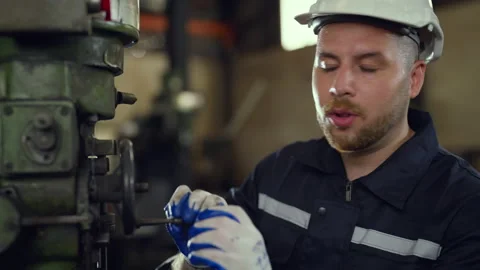 Engineer checking and maintenance machine at factory. Stock Footage 229404145