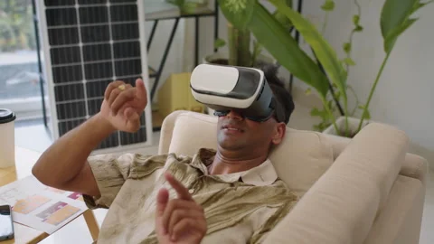 Engineer Checking App in VR Headset, Lying on Sofa at Office Stock Footage 276889760