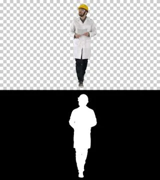 Engineer checking papers and looking around to sides, Alpha Chan Stock Photos