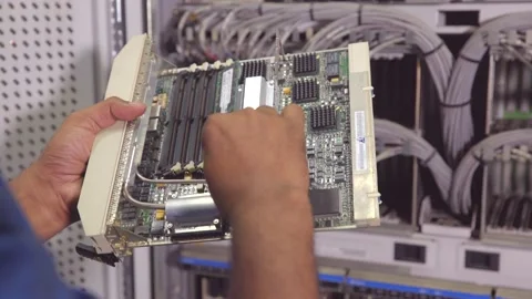 Engineer checking in a server hardware assembly room Stock Footage 220176972
