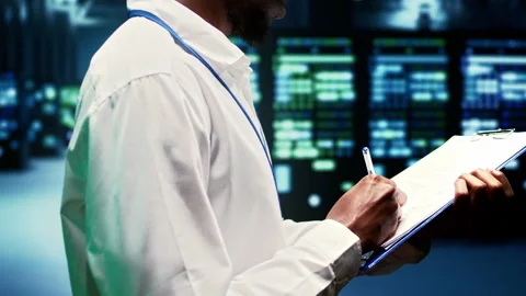 Engineer checking web servers Stock Footage 246714213