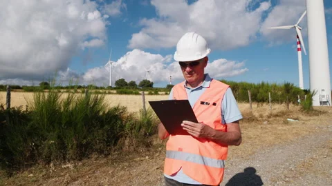 Engineer Checking The Work Of Wind Turbines Stock Footage 286720207