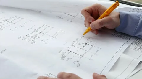 Engineer checks the construction drawings Stock Footage 8655480