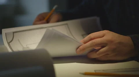 Engineer checks the construction drawings Stock Footage 58914282