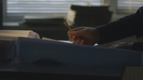 Engineer checks the construction drawings Stock Footage 58914416