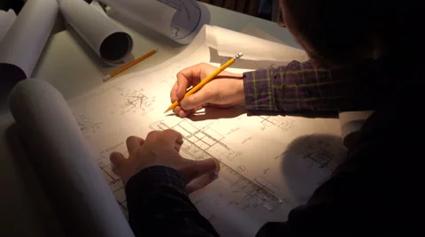 Engineer checks the construction drawings Stock Footage 59508856