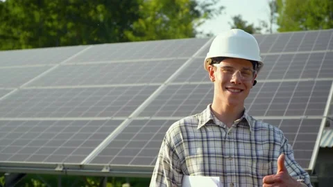 Engineer checks solar panels productivity. Alternative energy concept Stock Footage 138872515