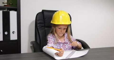 Engineer Child Working at Office, Kid in Construction Field Drawing Project Stock Footage 317079671