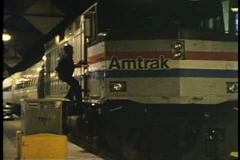 The Engineer climbs into the locomotive (F40) of Amtrak's