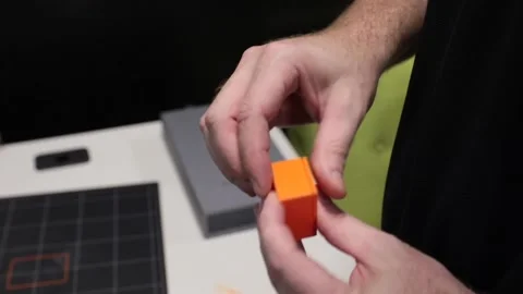 Engineer closing plastic box constructed by 3D printing Stock Footage 205196223