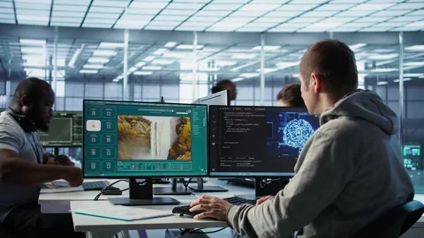 Engineer coding AI virtual assistant producing clips Stock Footage 319264709