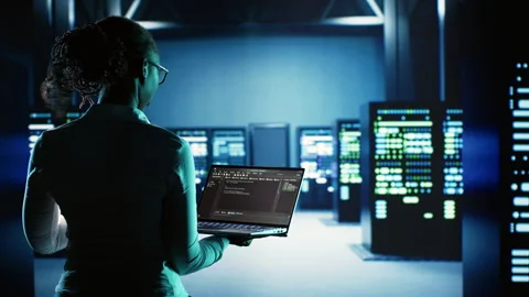 Engineer coding in data center Stock Footage 249564711