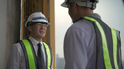 Engineer concept of 4k Resolution. Business people shake hands to congratulat Stock Footage 144700516