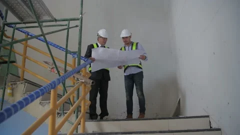 Engineer concept of 4k Resolution. Business people checking the strength of b Stock Footage 146616117