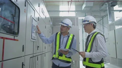 Engineer concept of 4k Resolution. The employee is checking the generator. Stock Footage 146616138