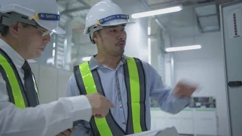 Engineer concept of 4k Resolution. The employee is checking the generator. Stock Footage 151887799
