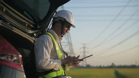 Engineer concept of 4k Resolution. An employee is using a tablet to work at a Stock Footage 158896929