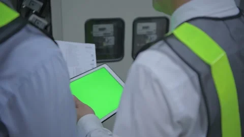 Engineer concept of 4k Resolution. The operator is reviewing the job based on Stock Footage 146616135