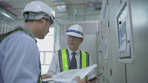 Engineer concept of 4k Resolution. The technician is coordinating the team le Stock Footage 147989134