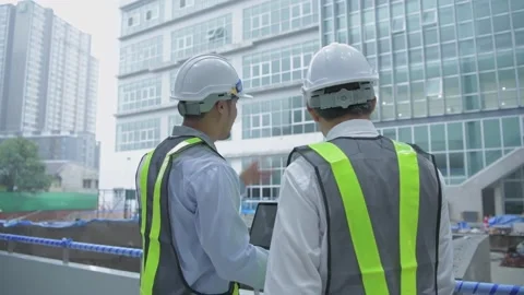 Engineer concept. Business man planning construction of the building. 4k Reso Stock Footage 143113457
